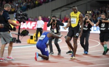  Championnats du monde : Quand Justin Gatlin s'agenouille devant Usain Bolt à l'arrivée du 100m 