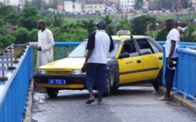 LE TAXIMAN, LA PASSERELLE ET LE PEUPLE SENEGALAIS